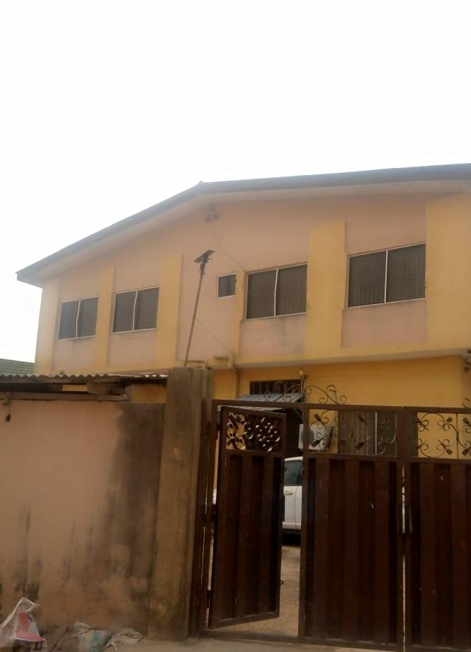 A Block of 4 flat 3bedrooms with a mini flat and a room self contain